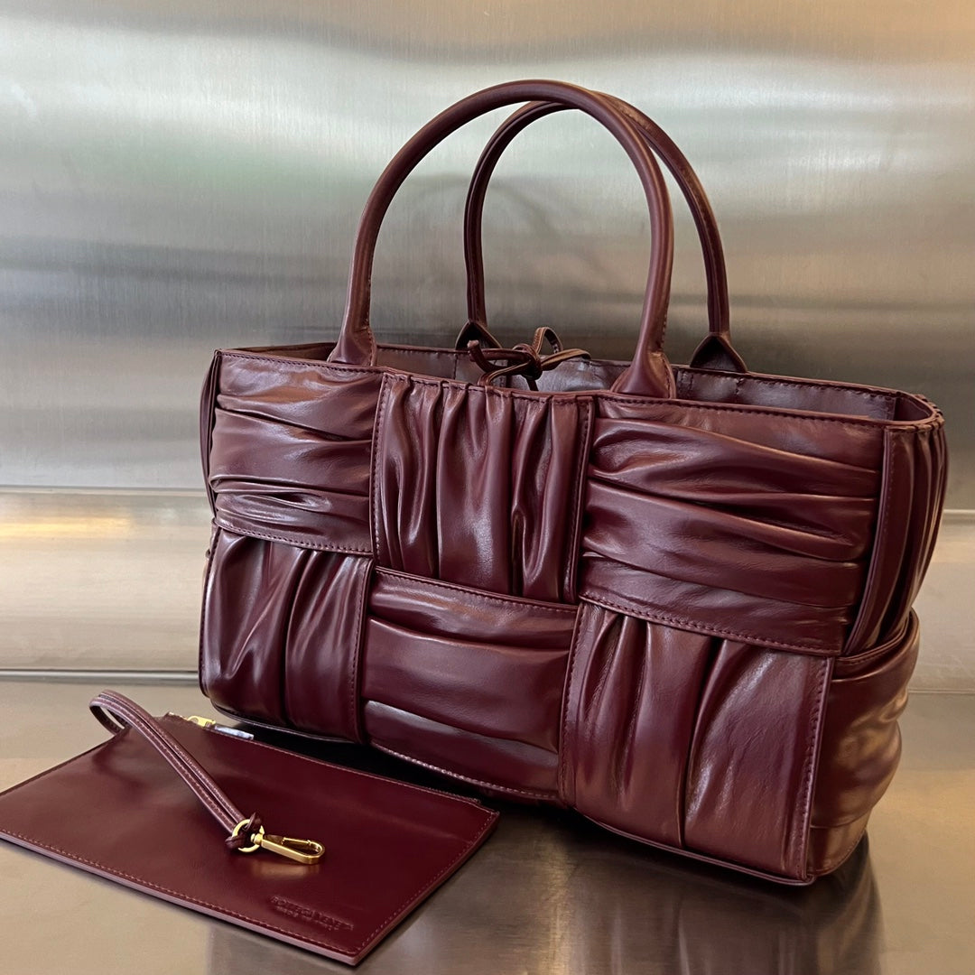 BOTTEGA VENETA SMALL ARCO TOTE 30 IN WINE RED SOFT LAMBSKIN