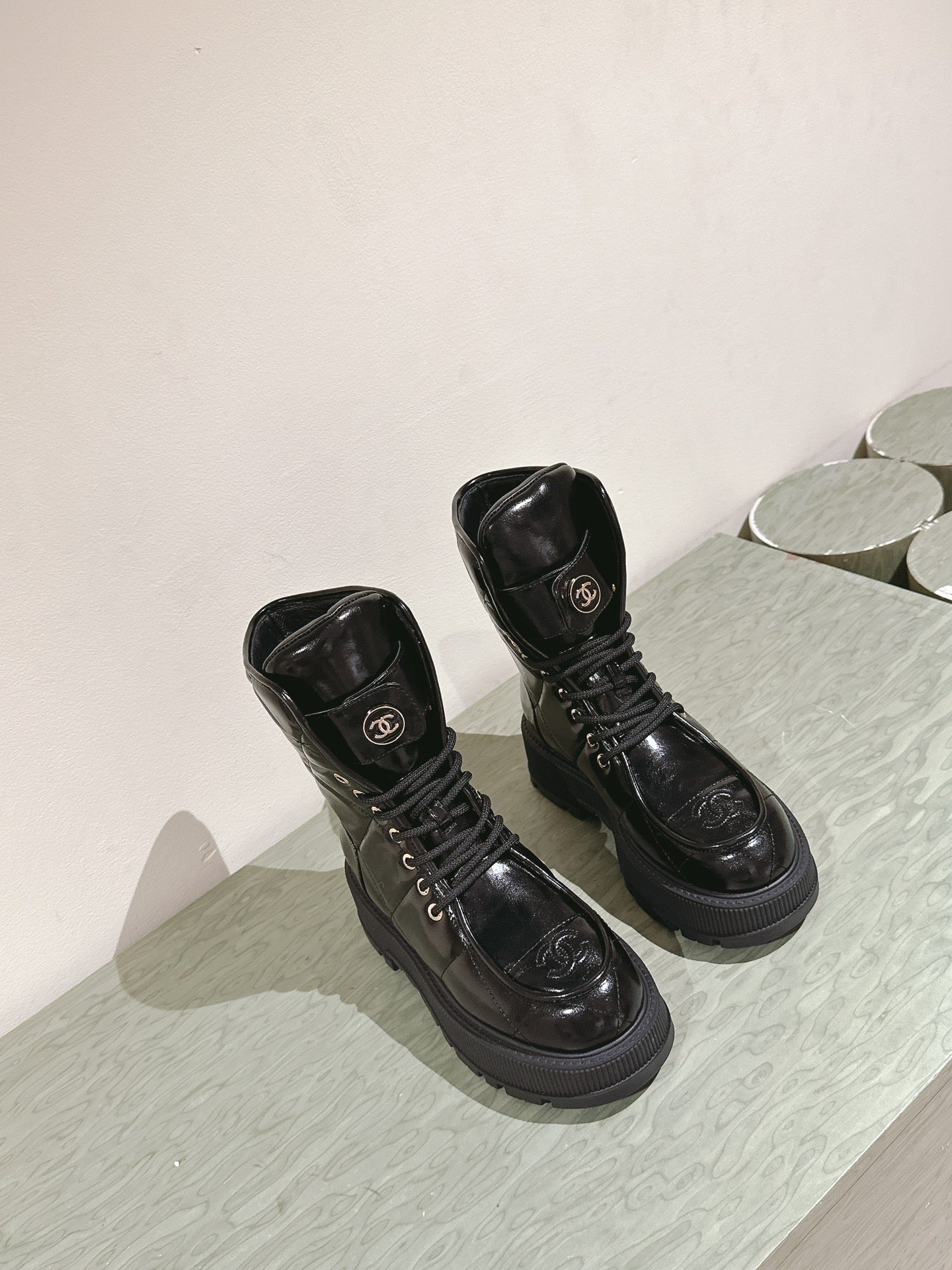 CHANEL MARTIN BOOTS IN BLACK EMBROIDERED CALFSKIN