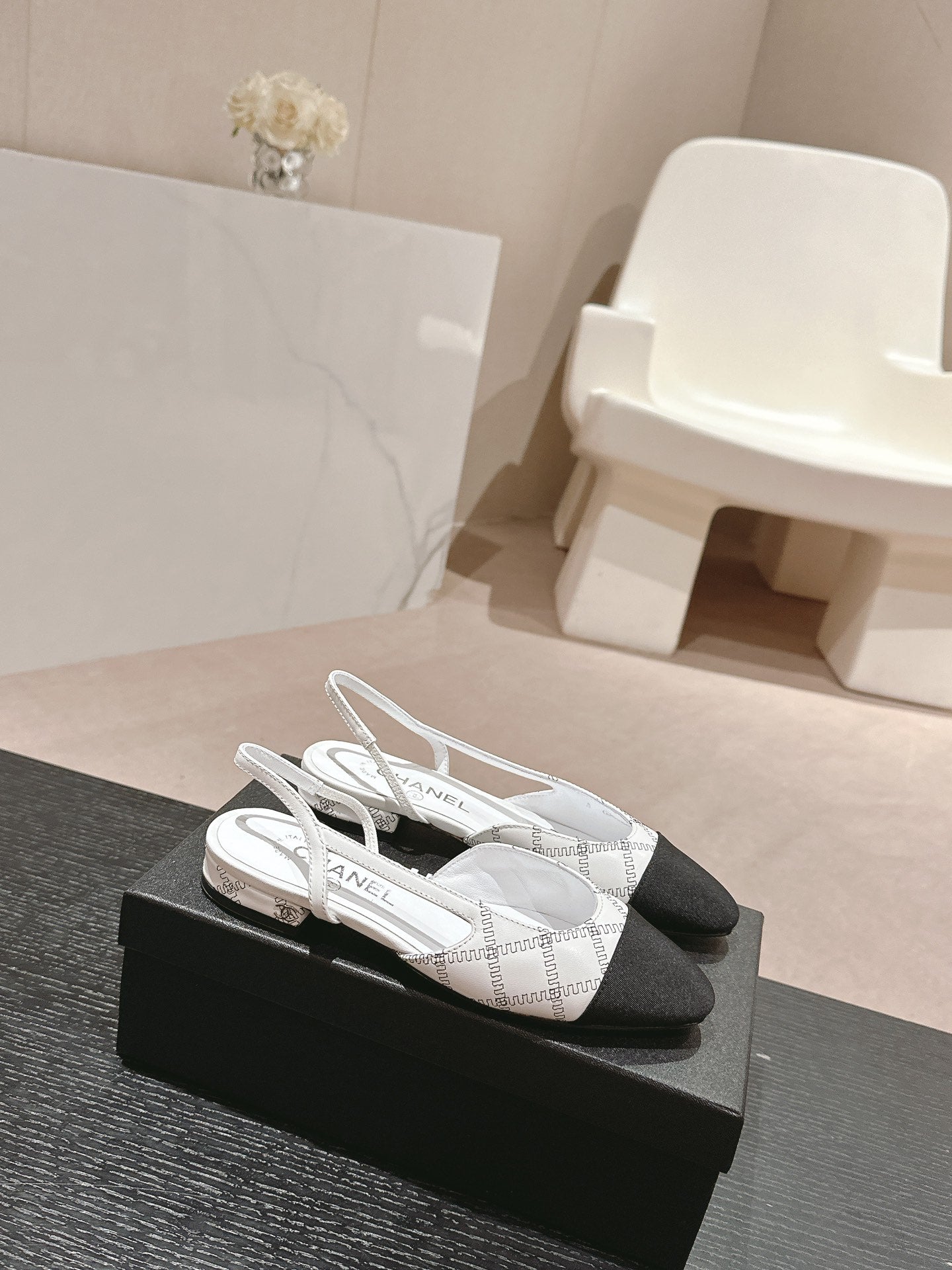 CHANEL SLINGBACKS IN WHITE LAMBSKIN AND BLACK SATIN