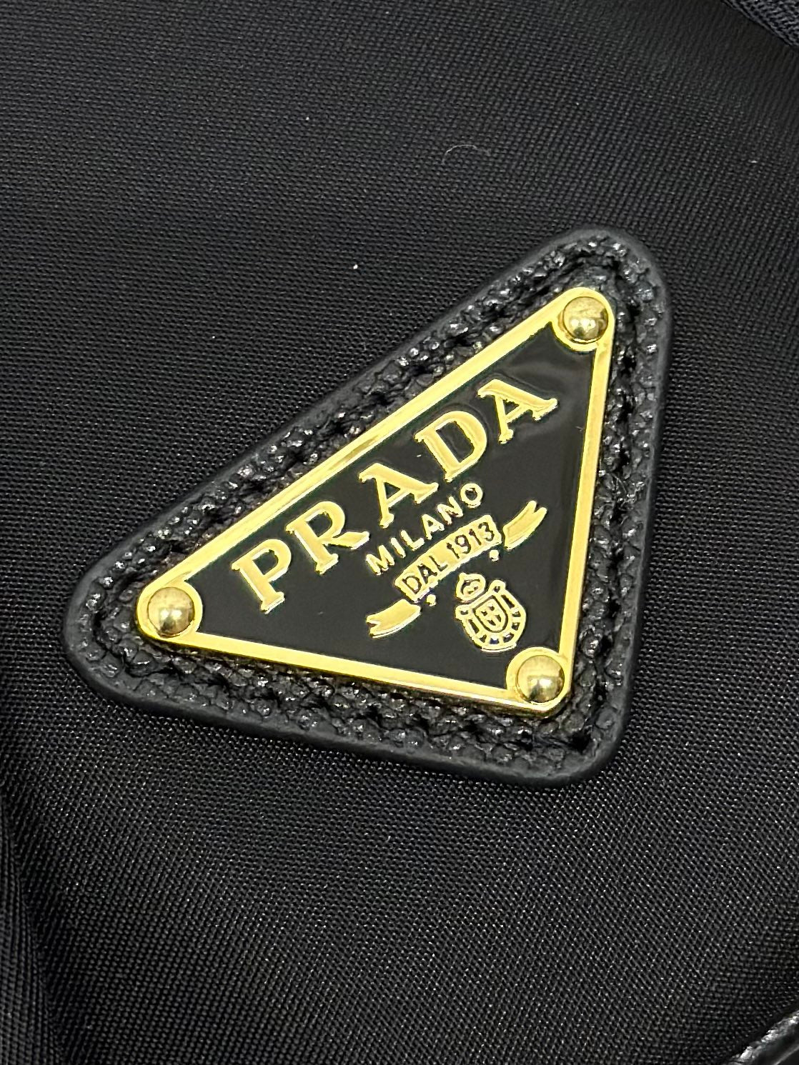 PRADA BUCKET BAG 19 IN BLACK RE-NYLON AND CALFSKIN HANDLE